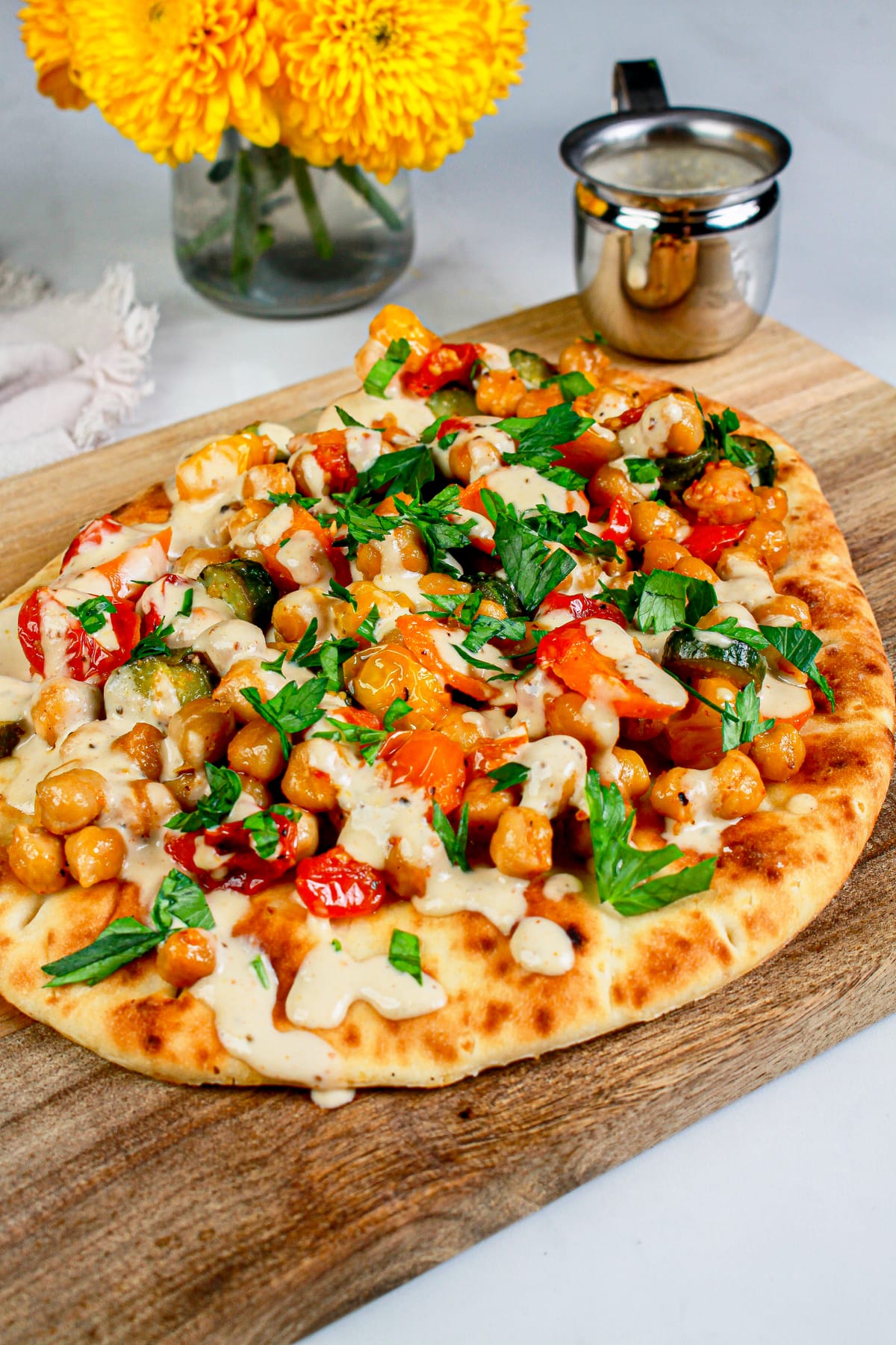 Garlic Roasted Chickpea & Veggie Flatbread with Lemon Tahini Drizzle